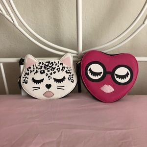 Pair of Betsey Johnson wristlets